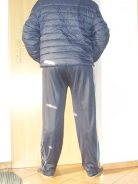 A dick in slippery sweatpants and a jacket photo 7