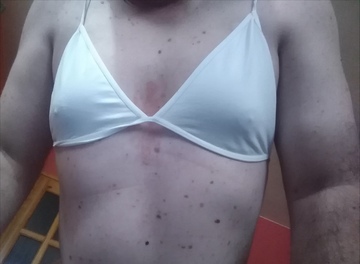 Chubby guy posing in thong and bra photo 11